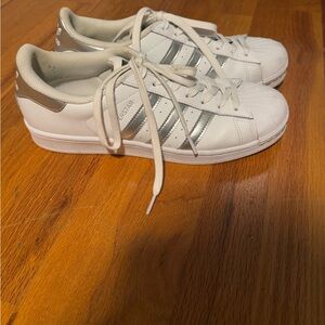 Adidas Superstar sneakers | white with silver accents in size 10